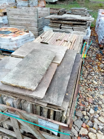 Secondhand weathered sandstone for paving